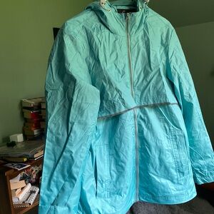Aqua blue light rain coat size large. High-vise strips front and back